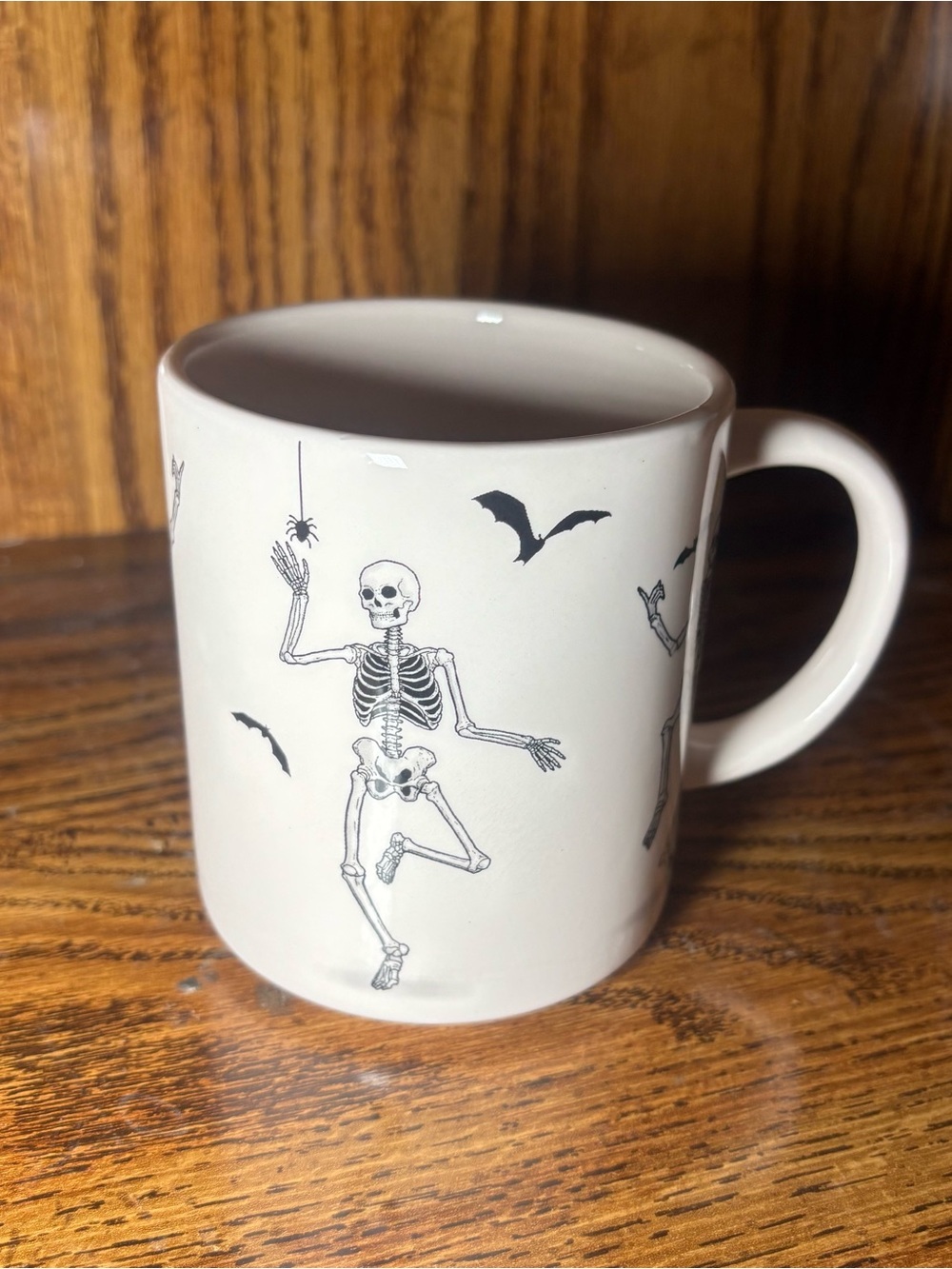 Kirklands White Ceramic Mug with Black Skeleton & Bat Design